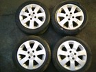 SET OF COSMETICALLY ROUGH VAUXHALL CORSA C SXI 15 ALLOY WHEELS  DECENT TYRES