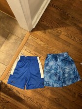 Under Armour athletic boys blue shorts 2 pair sold together size L
