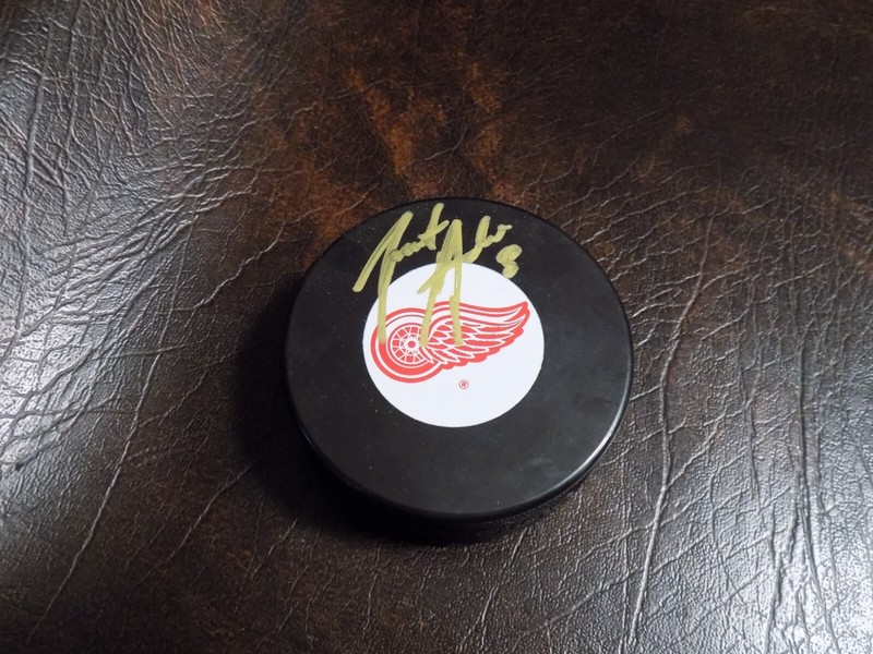JUSTIN ABDELKADER AUTOGRAPHED RED WINGS PUCK W/COA