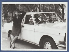 Beautiful girl by the car young woman with long hair Soviet Vintage Photo USSR