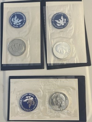 1972, 1973, 1974 Eisenhower 40% Silver Dollars Blue Envelopes, Uncirculated