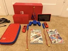 Nintendo Switch Mario Red & Blue Edition with 2 Games and 32GB Card