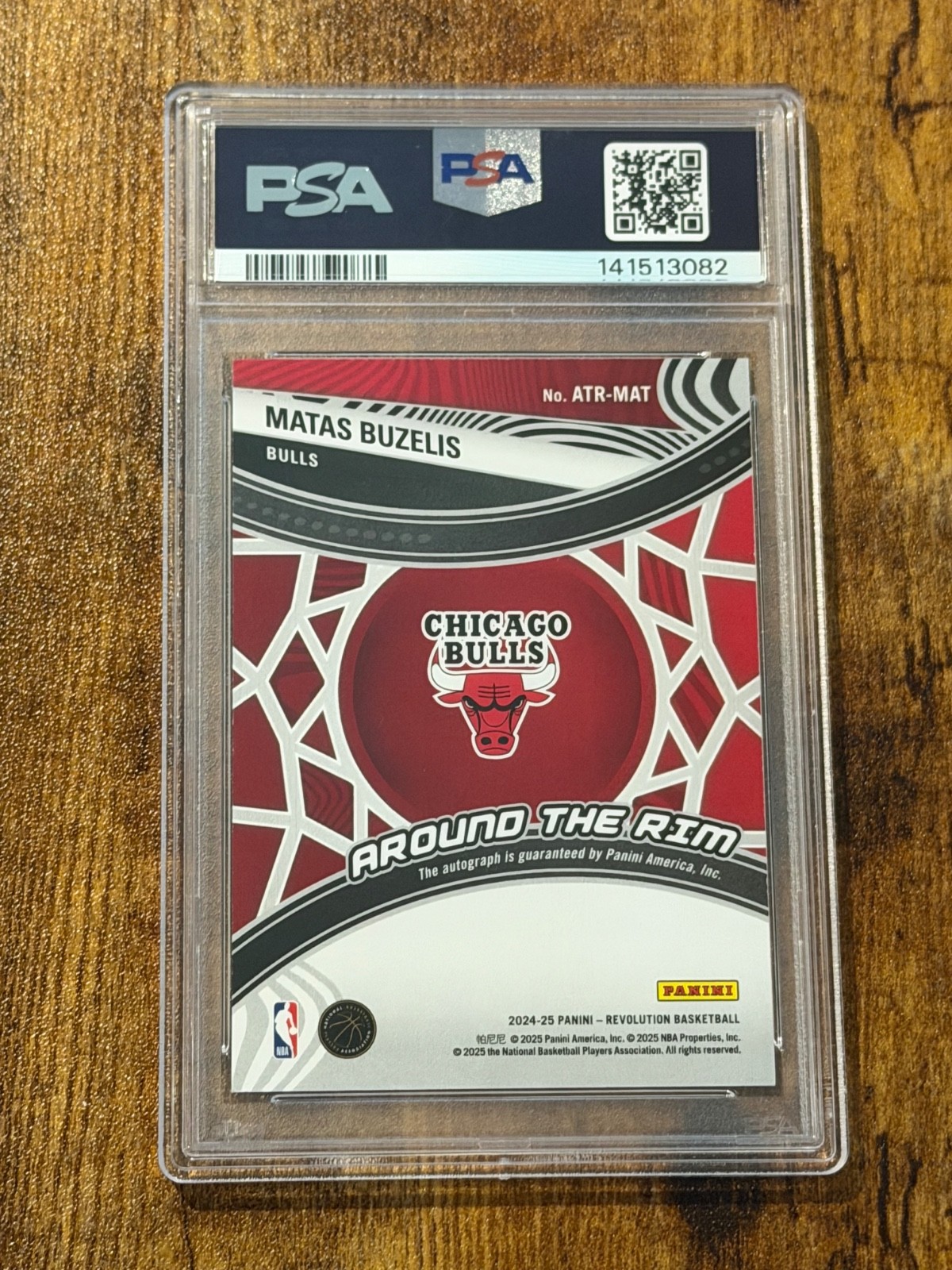2024-25 Panini Revolution Basketball MATAS BUZELIS Around The Rim RC Auto PSA 8 view 2