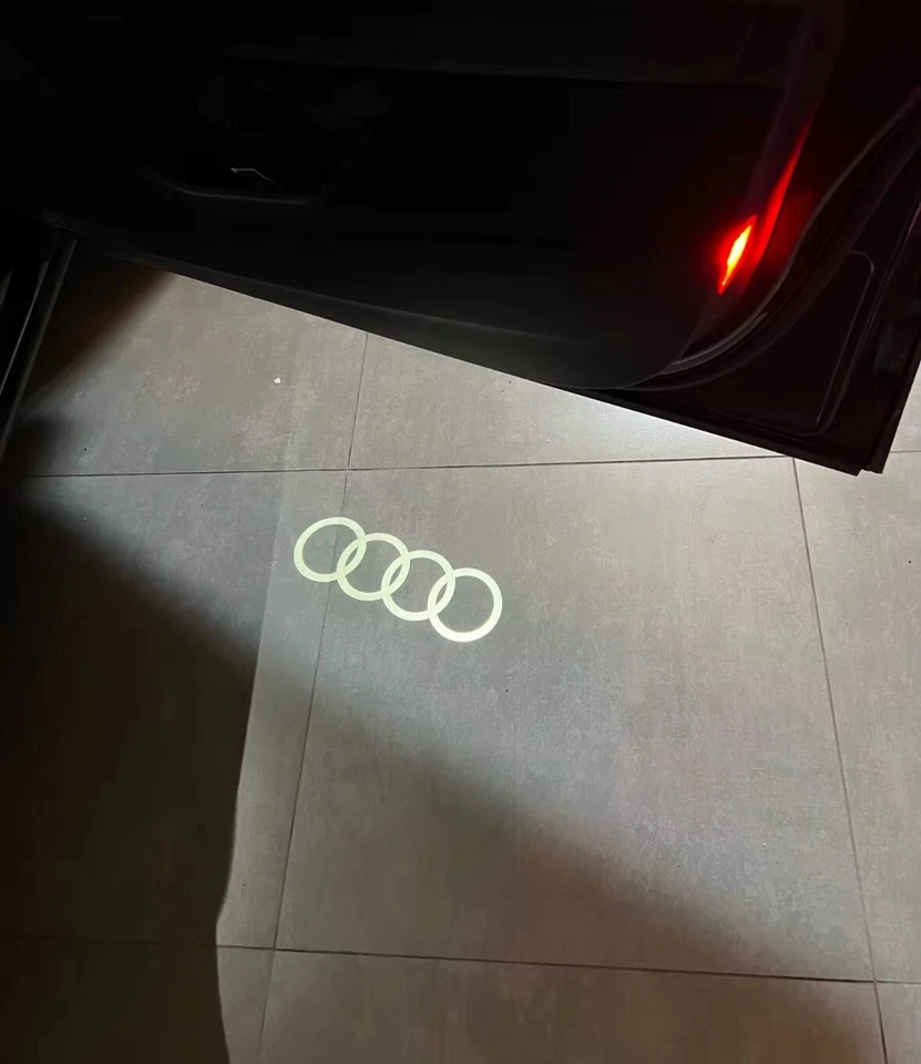 2 Luci Sottoporta Audi a LED "Anelli AUDI" Plug & Play A3/5/6/7 TT Q3 - Immagine 4 di 4