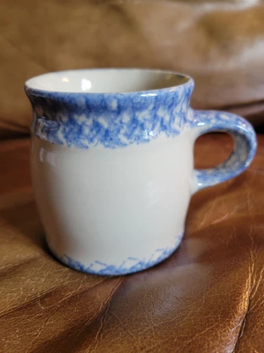 WORKSHOPS OF GERALD HENN WHITE/BLUE COLORED SPONGE WARE COFFEE MUG
