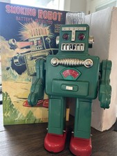 Smoking Spaceman Battery Operated Robot Green