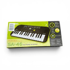 E1 Casio SA-46 Mini Electronic Keyboard 32-Key Green 100 Tones 50 Patterns