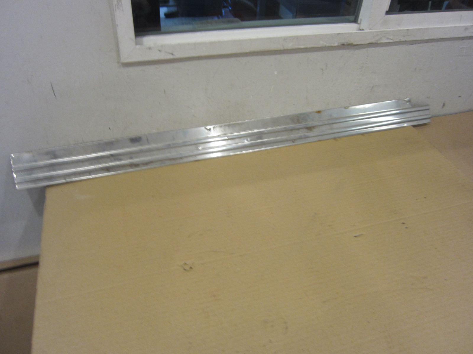 Ferrari Mondial - LH Under Door Molding / Sill Plate (USED) - P/N 60674900