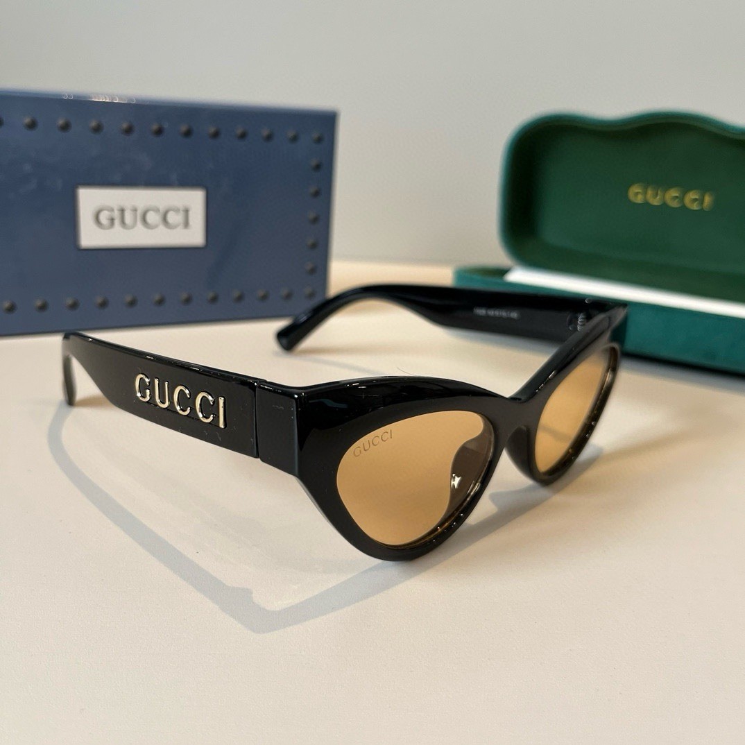 Gucci Women’s Cat Eye Sunglasses Black Plastic Frame Brown Tinted Lenses