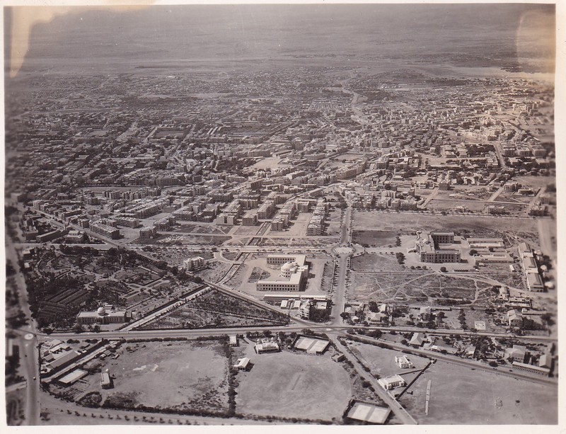 Vintage photo B/W aerial view unknown city view buildings field highway