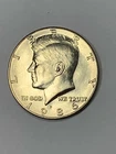 1986-D Clad Uncirculated Kennedy Half Dollar