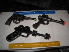 Lot vintage toy pistols, Buck Rogers pop-gun, tin revolver, homemade Ray-Gun,