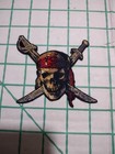 Pirates Of The Caribbean Sew On Patch Skull And Cross Sword — photo 1