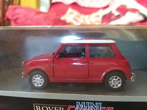 Modellino Rosso Rover MINI COOPER porte apribili scala 1/32 da collezione - Foto 2 di 9