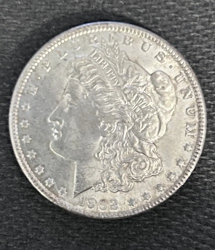1902-O Morgan Dollar, AU..Melt value is $89 at today's spot price