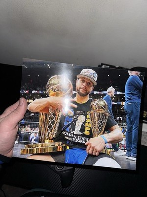 in person stephen curry signed 8x10. it s 100% authentic but has not been COA.