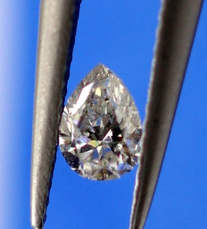 Diamante suelto natural certificado de 0,13 quilates 3 x 2 mm corte pera color F grado SI1 Foto 2 de 4