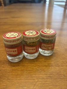 Vintage Craft Glitter Chemical Company Double Plated In red, gold and green.