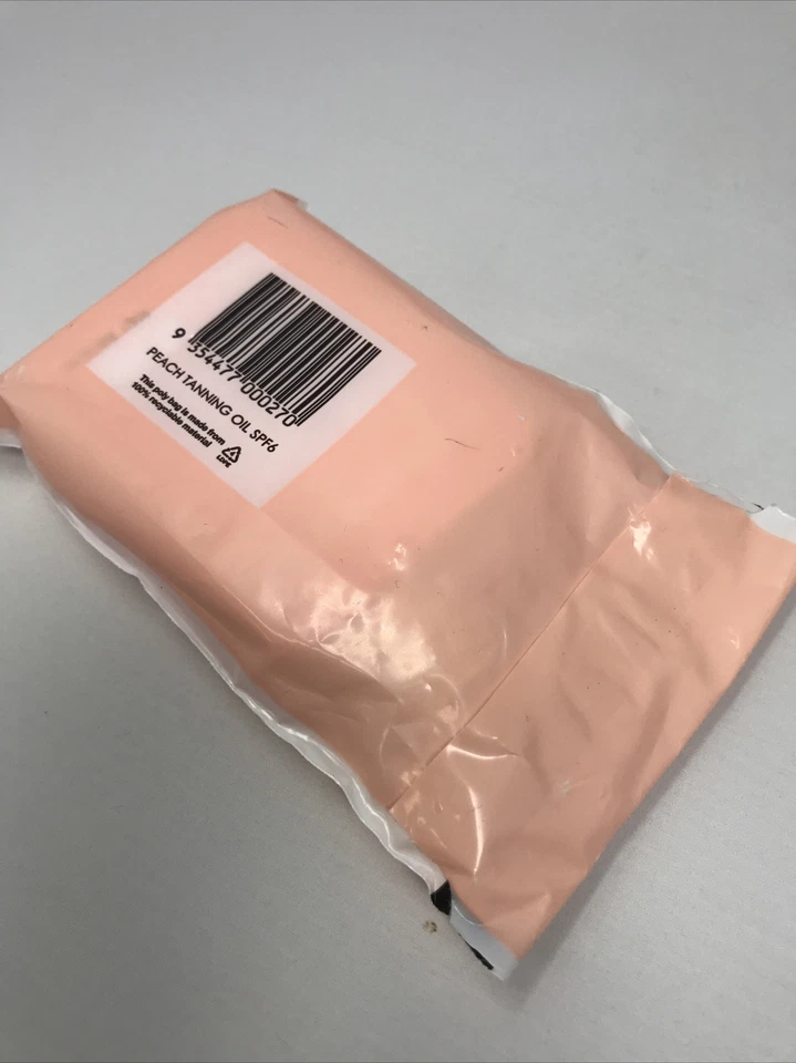 Bali Body Peach Tanning & Oil For The Perfect Tan Body In a Variety Of Scents Foto 2 de 2