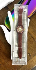 1990’s Swatch Original Box MusiCall "Brown Piano" SLF100 Watch Leather Band