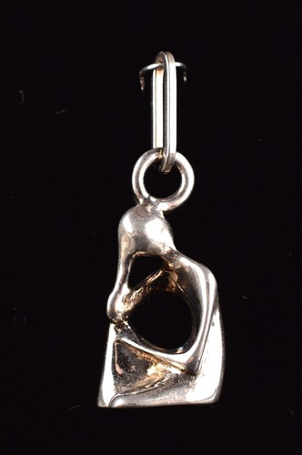 Silver Charm figurine