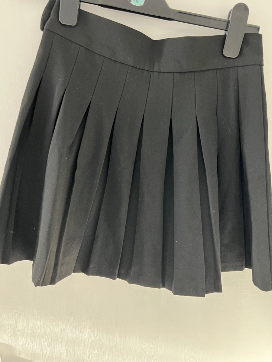 Minifalda plisada negra Bershka