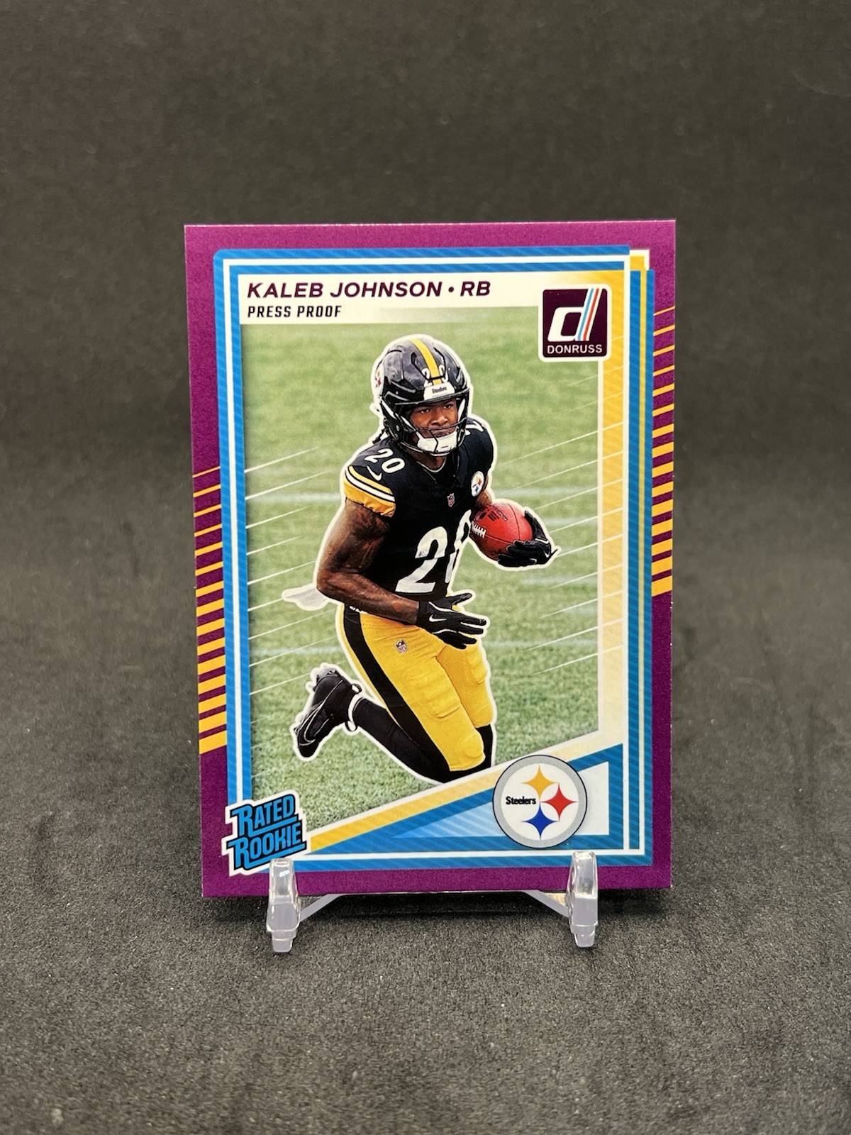 2025 Donruss Kaleb Johnson Purple Press Proof Rated Rookie #322 Steelers RC Iowa