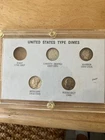 1875 seated liberty dime 1910 barber 4 dimes in case including Merc & Roosevelt.