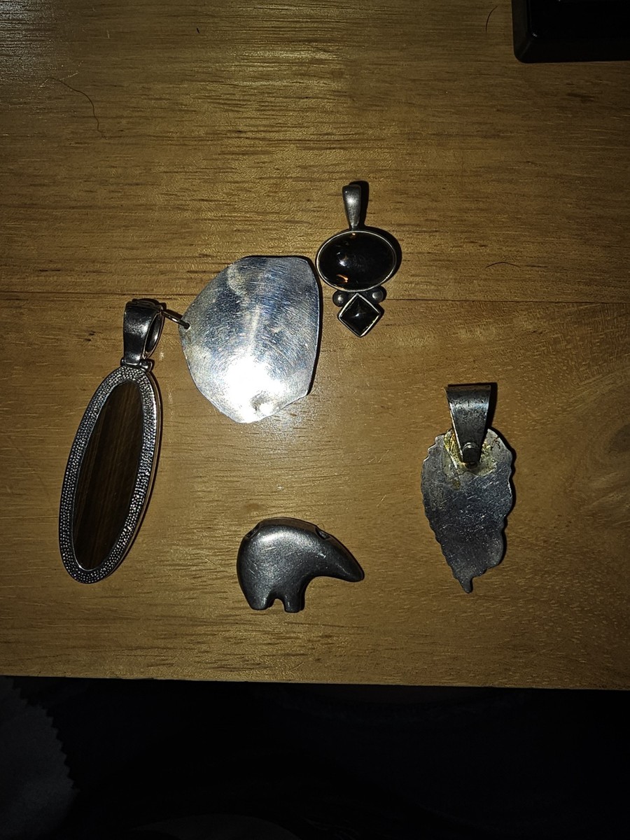 Multiple Silver And Stone Pendants. View 2