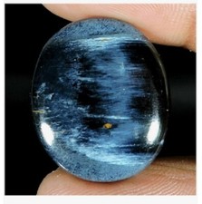 Pietersite bleu nuit effet chatoyant en cabochon ovale de 20.42Cts