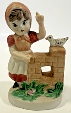 Lefton Vintage Figurine – Little Girl Orange Dress Bonnet with Bird Brick Wall