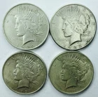*LOT OF 4 MIXED DATE SILVER PEACE DOLLARS * NR #P3120