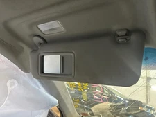 Used Left Sun Visor fits: 2016 Toyota Camry w/illumination w/sunroof Left Grade