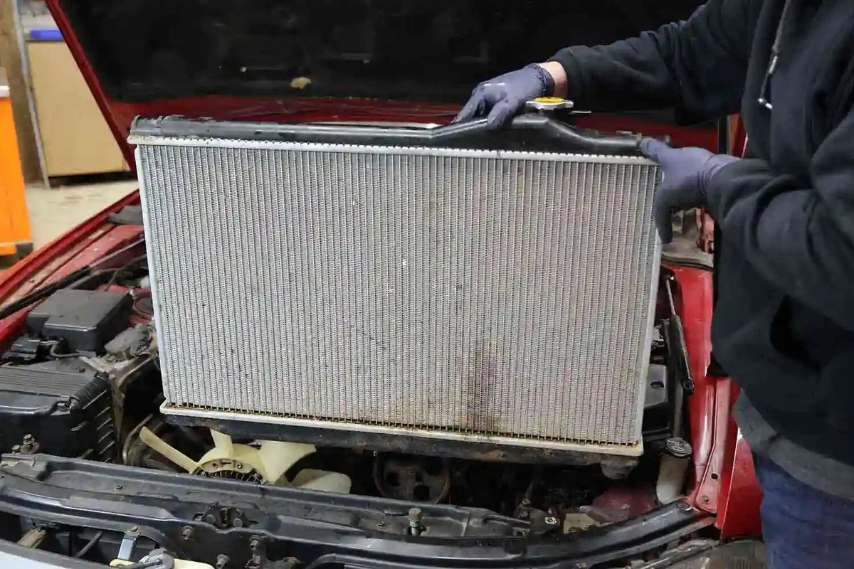 Removing the old radiator.