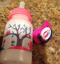 BABY ALIVE ONE BOTTLE AND ONE PACIFIER FOR BABY ALIVE DOLLS SHOWN 4 OZ SIZE