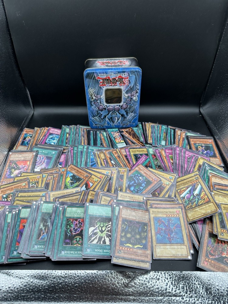 Vintage Yu-Gi-Oh Card Lot with Raviel Tin - 600+ Cards Including Spells, Traps, Monsters