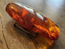 Brosche mit baltischen geschliffenen Bernstei...