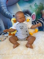 Reborn Soft Cloth Body Chunky Baby. Weighted: 8 Pounds 8oz/Length: 24 Inches.