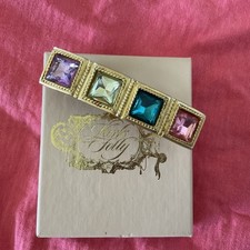 Vintage Kirks Folly multi Color Crystal Gold Tone Color Signed Hair Barrette