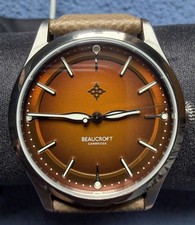 The Arc Beaucroft watches - Burnt orange dial 38mm 100m water resistance.