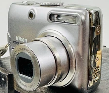 Nikon COOLPIX P4 VR 8.1mp Digital Camera W/Charger ,2 Batteries & Case