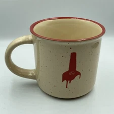 Maker’s Mark Speckled Ceramic Mug With Red, Dripping Wax Design.