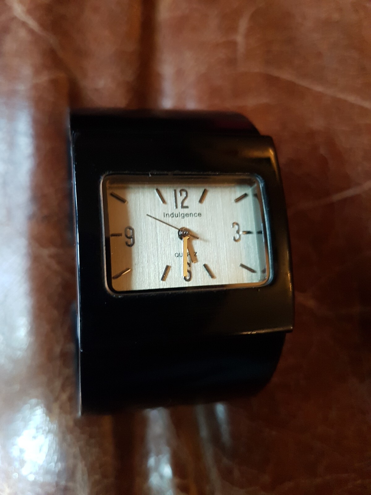BNIB INDULGENCE Ladies watch solid sprung black metal strap silver face eBay