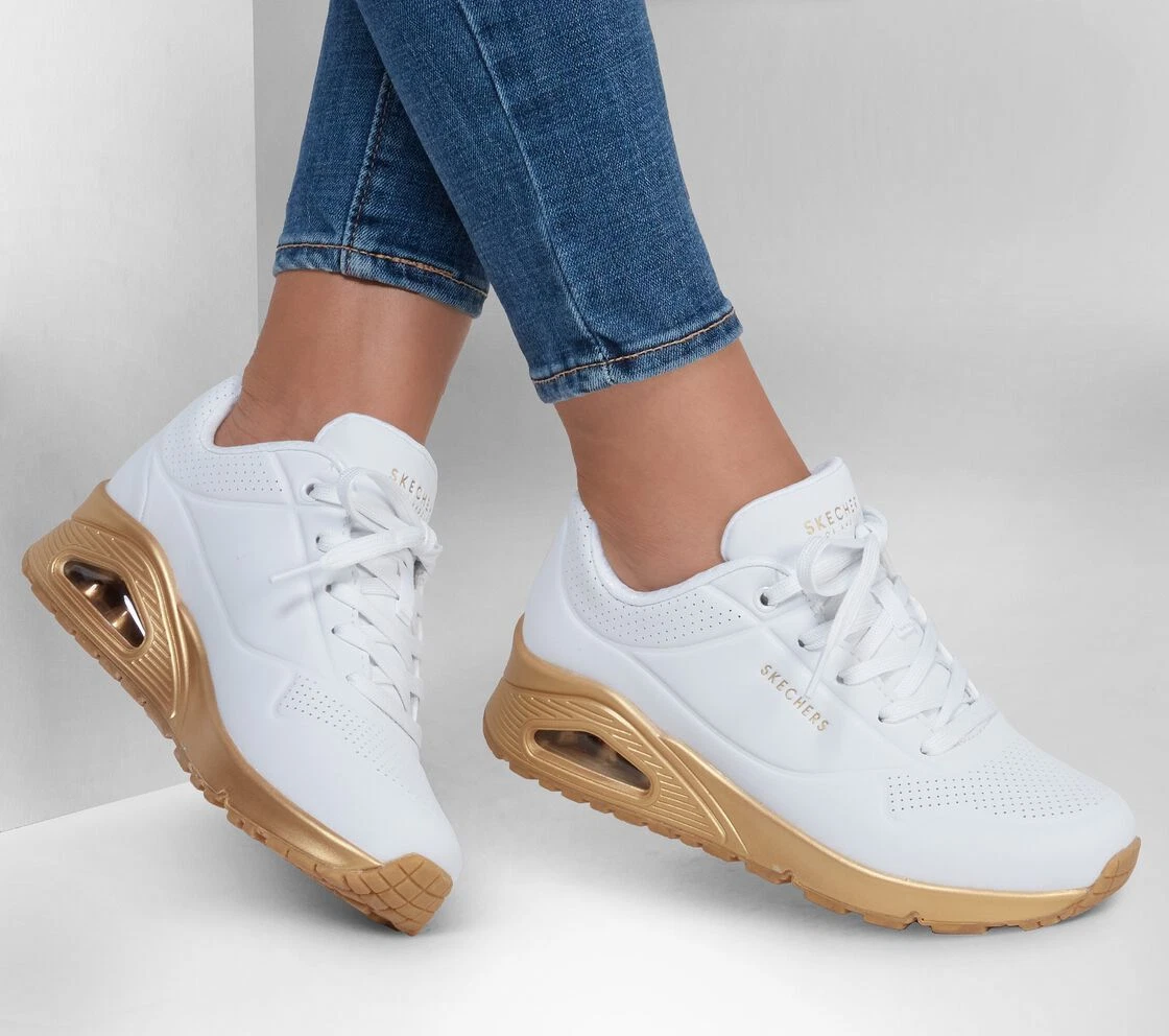 Skechers white sales and gold