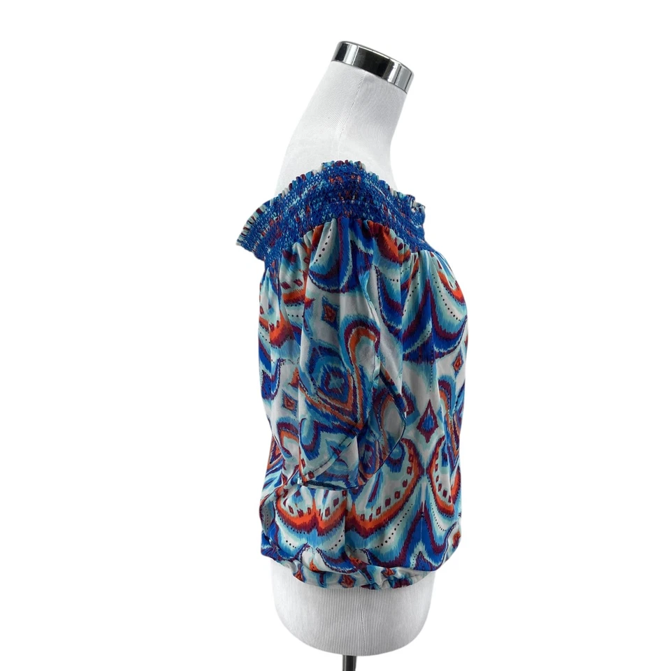 Blusa top bebe para mujer azul medio estampado geográfico manga abertura calada al hombro Foto 3 de 4