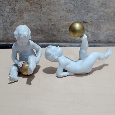 Vintage Porcelain Boy Playing Golden Ball Figurines Set of 2 Repaired Feet