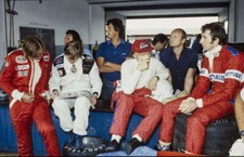 James Hunt and Ronnie Peterson look through a magazine whilst- 1978 Old Photo