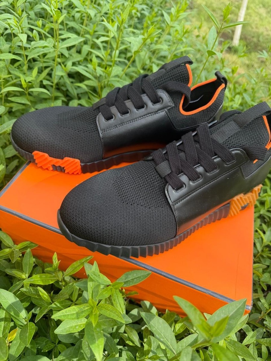 Men's slip-on sneakers in jersey and leather with orange trim from