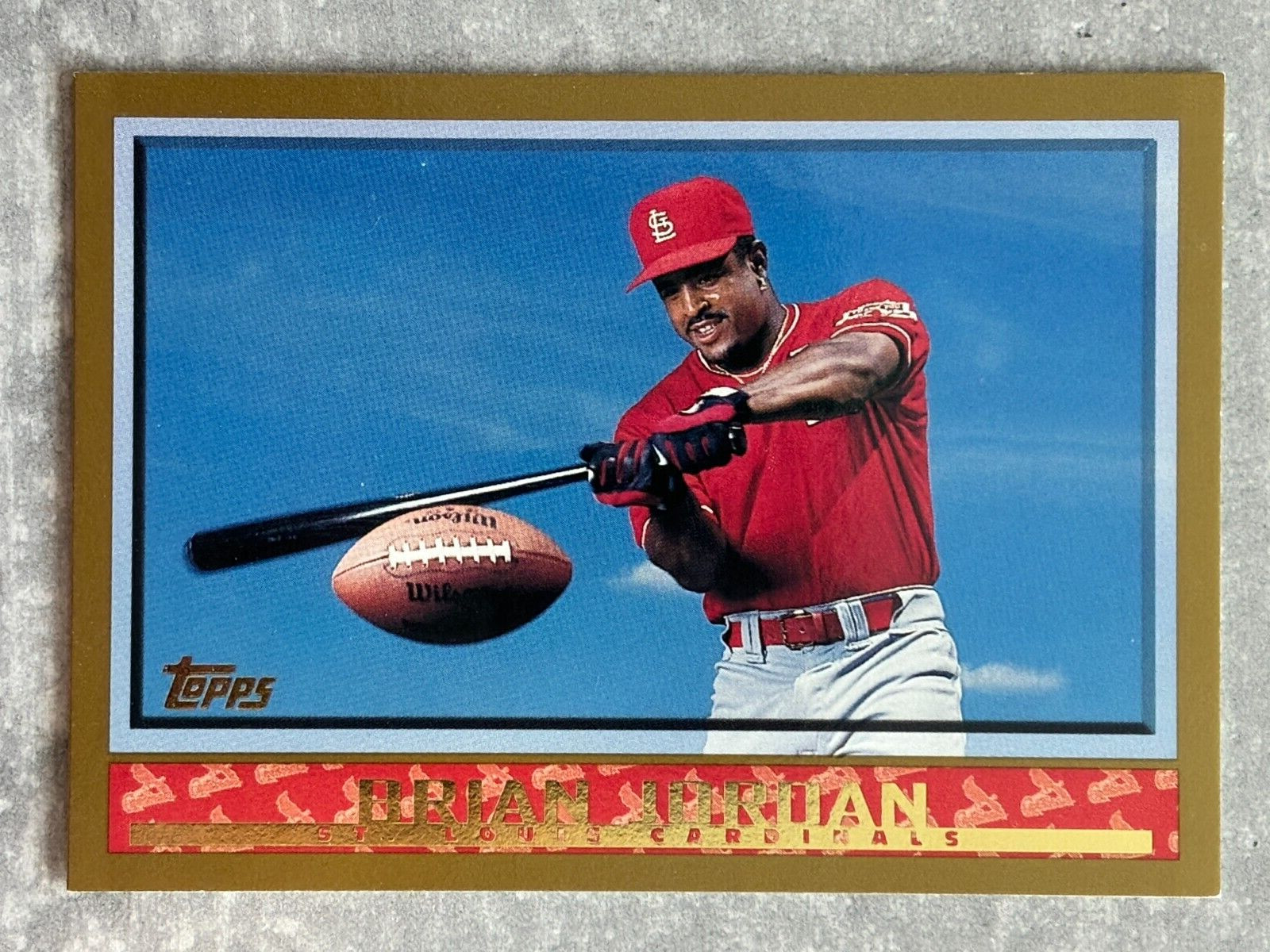 1998 Topps BRIAN JORDAN Two Sport Star "Batting a Football" Funny Real Card #287