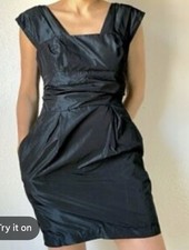 BCBGeneration cocktail dress features cap sleeves and a ruched waist Blue Haze